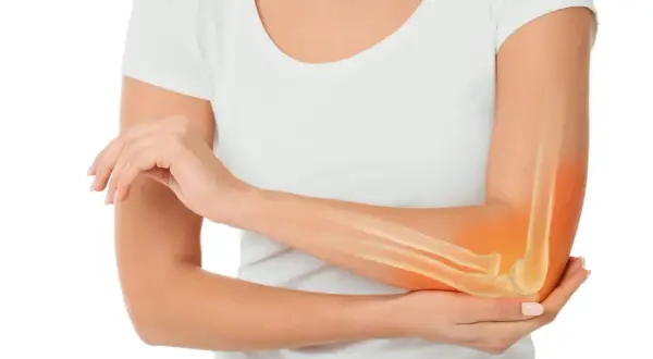 Ręka z widocznym zarysem kości przedramienia i łokcia, podświetlonym na pomarańczowo. Może to symbolizować ból lub problemy, takie jak osteosarcoma.